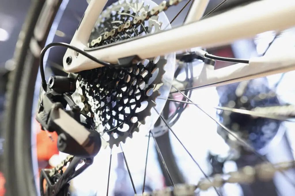A close up of a bicycle with gears on it.