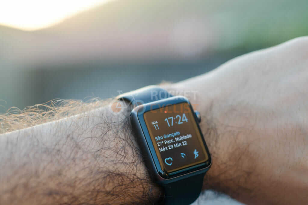 An apple watch on a person's wrist.