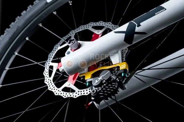 A close up of a mountain bike with a disc brake.