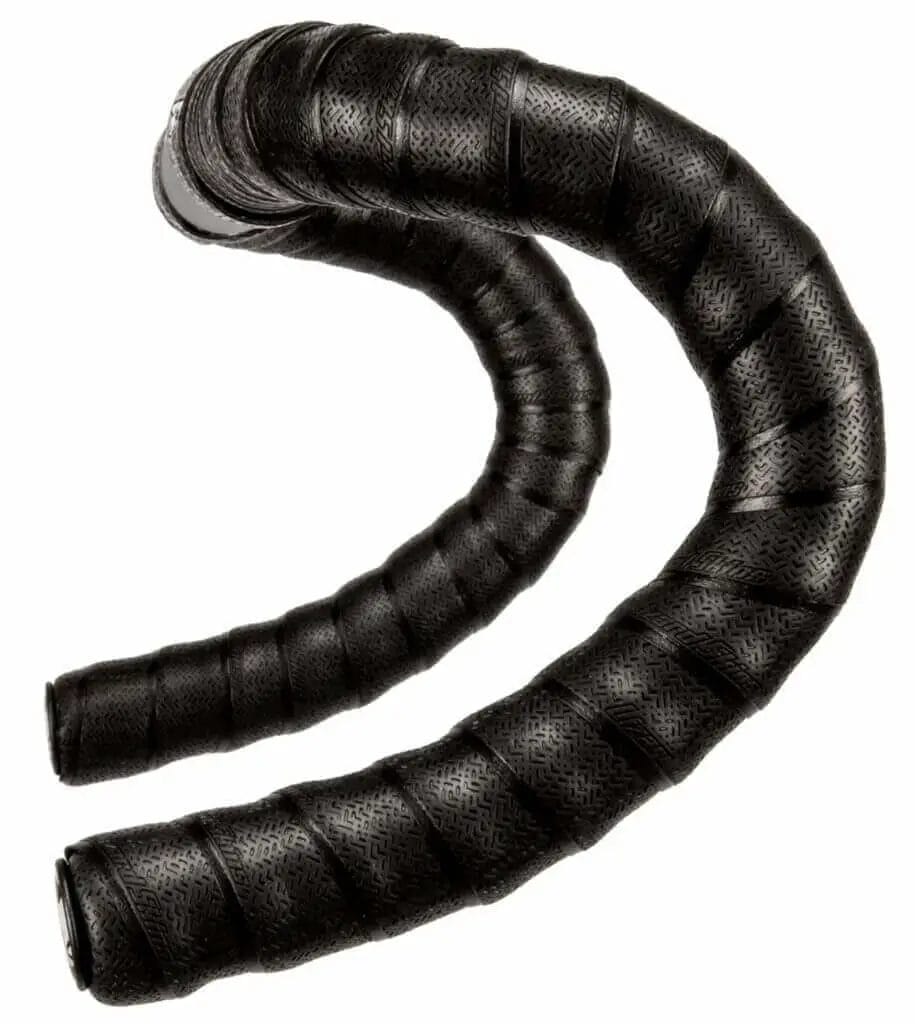 A pair of black leather hoses on a white background.