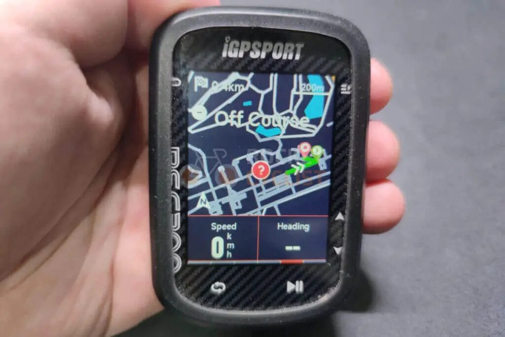 A person holding a gps device with a map on it.