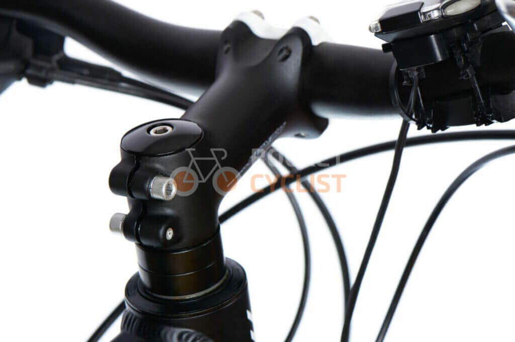 A close up of the handlebars on a bicycle.