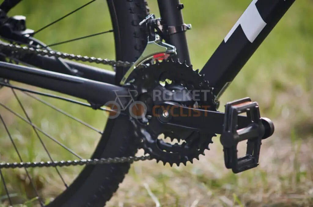 A close up of a mountain bike chainring.