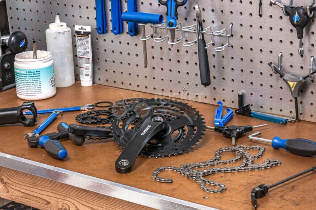 A table with a lot of tools on it.