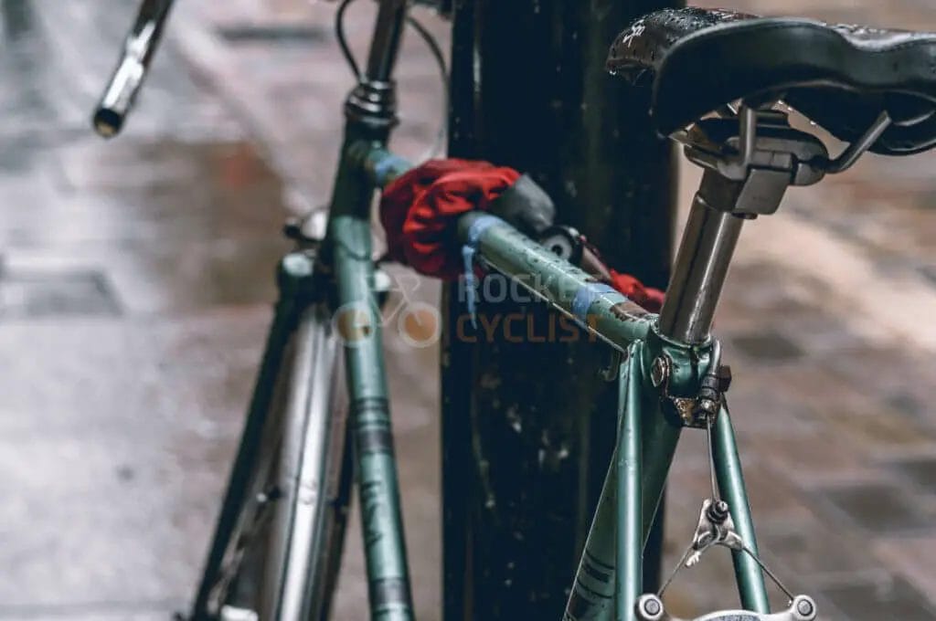 A bicycle parked on a sidewalk.